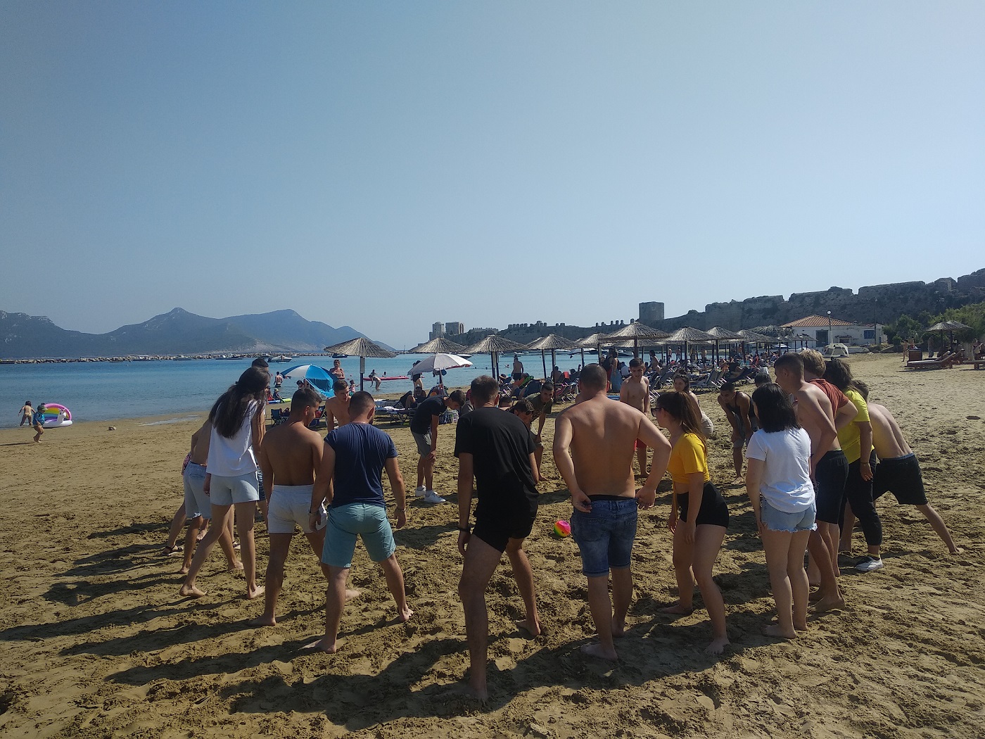 youngsters playing on the beach